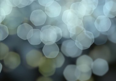 Karanlık arka planda Noel Bokeh 'inin 2D çizimi. Soyut doku. Dağınık noktaların arka planı. Bulanık parlak ışık. Dairesel noktalar. Noel arifesi. Renkli daire şekilleri.