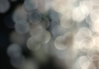 2D çizim. Bokeh soyut dokusu. Renkli. Odaklanmamış arka plan. Bulanık parlak ışık. Dairesel noktalar. Noel arifesi.