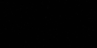 Siyah arkaplanda uçan toz parçacıkları