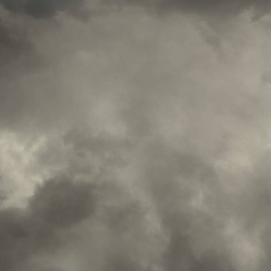  bulutlar doku ile gökyüzü bir arka plan vintage sepya olarak yararlı