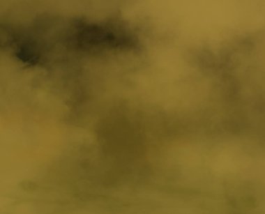 Siyah arka plan üzerinde sarı sis ve sis etkisi.