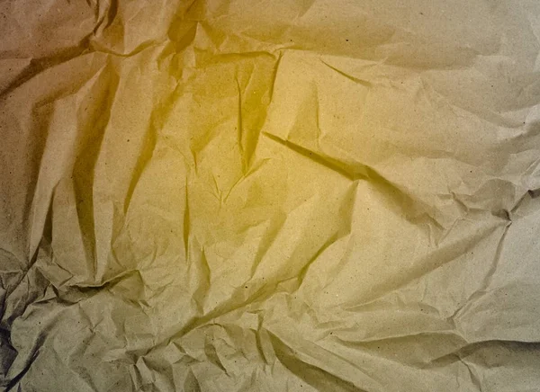 bir arka plan üzerinde sarı buruşturulmuş kağıt