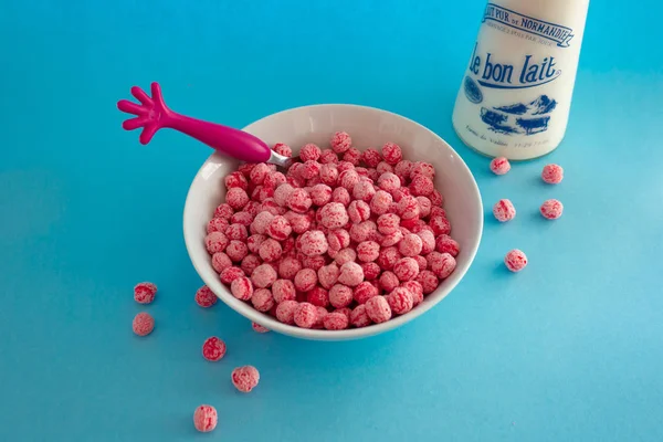 Fun and colorful bowl of pink cereal for kids