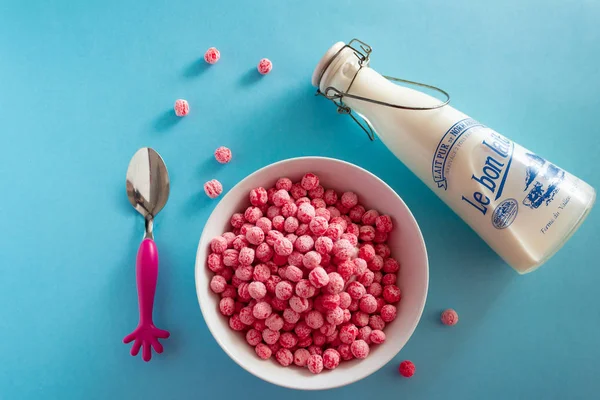 Fun and colorful bowl of pink cereal for kids
