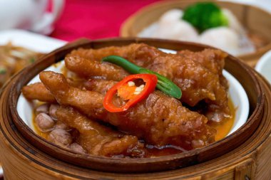 A Cantonese morning tea dim sum, Steamed Chicken Feet in Black Bean Sauce clipart