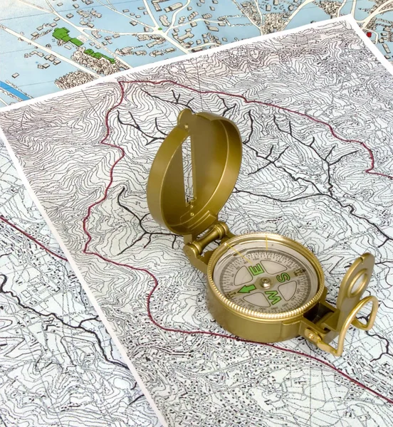 orienteering: compass on maps