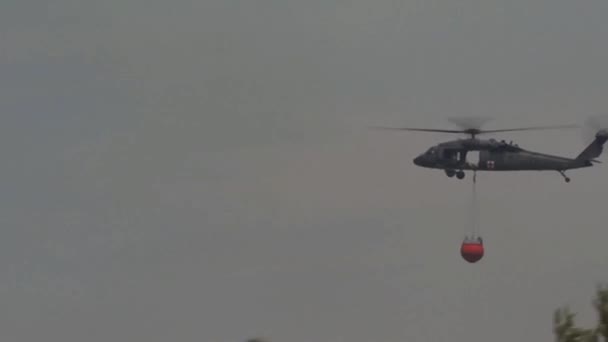Army Medevac Helicopter Flying Forest Fire Zone — Stock Video