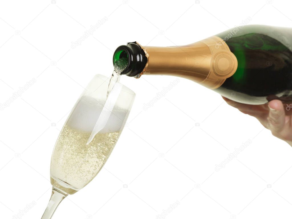 Pouring in sparkling champagne into a glass