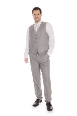 Beyaz arka plan üzerinde izole takım elbise genç işadamı