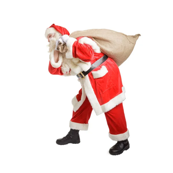 サンタ クロースとプレゼントの完全な袋 — ストック写真