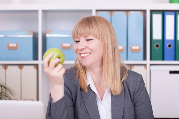 Businesswoman having a break in the office