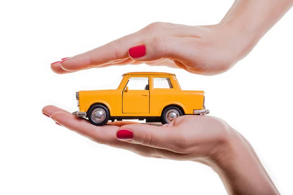 Female Hands Holding Car Stock Photo