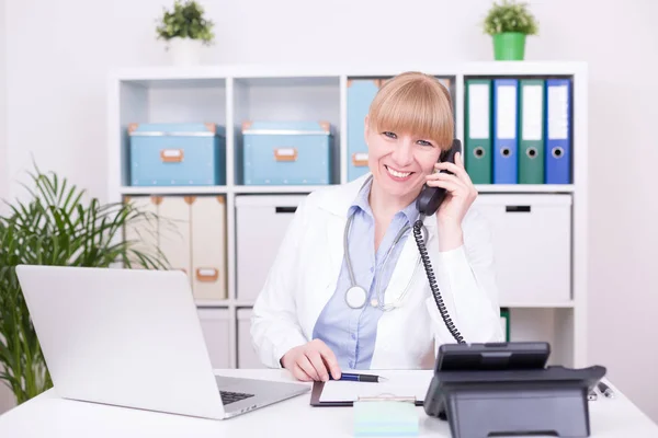 Cheerful Female Doctor Working Clinic Royalty Free Stock Photos