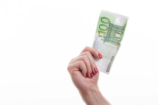 白い背景の上に紙幣を保持している女性 — ストック写真