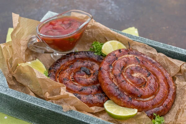 Grilled spiral sausages — Stock Photo, Image