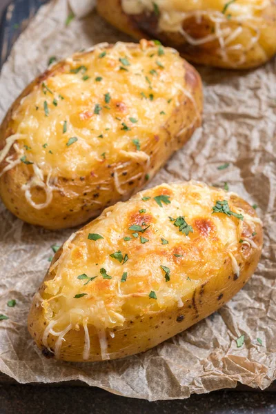 Baked loaded potato with bacon, cheese and onion — Stock Photo, Image