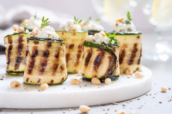 Grilled zucchini rolls stuffed with cream cheese — Stock Photo, Image