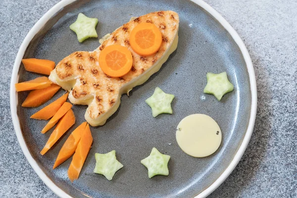 Funny grilled cheese sandwich look like rocket with stars — Stock Photo, Image