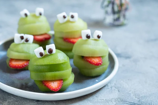 Spooky green kiwi monsters for Halloween — Stock Photo, Image