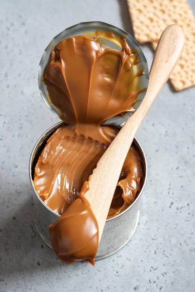 Dulce de leche in a can — стоковое фото