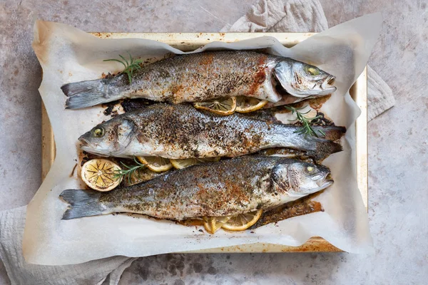 Fish seabass roasted with lemon — Stock Photo, Image