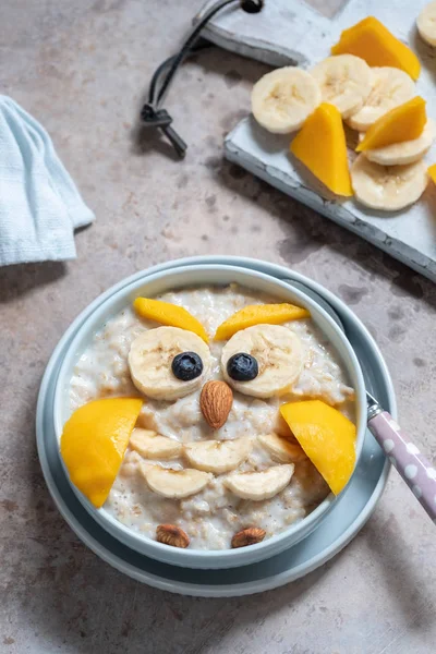 Funny kids breakfast porridge — Stock Photo, Image