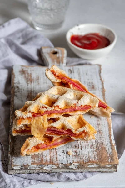 Pizza waffle with ham, pepperoni and cheese — Stock Photo, Image