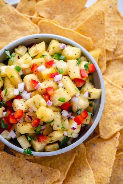 Pineapple salsa with nachos — Stock Photo, Image