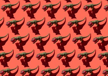 Kırmızı arka planda hediye kutusu desenli dinozor