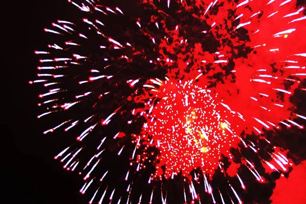 Fabulous radiance of bright red firework lights. during Halloween, Christmas, Independence Day, New Year.