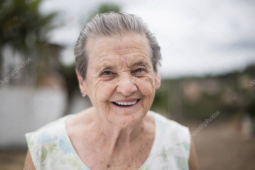 Portrait of a happy grandma - Portrait of a smiling elderly woman