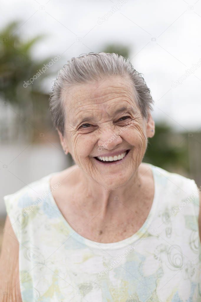 Portrait of a happy grandma - Portrait of a smiling elderly woman