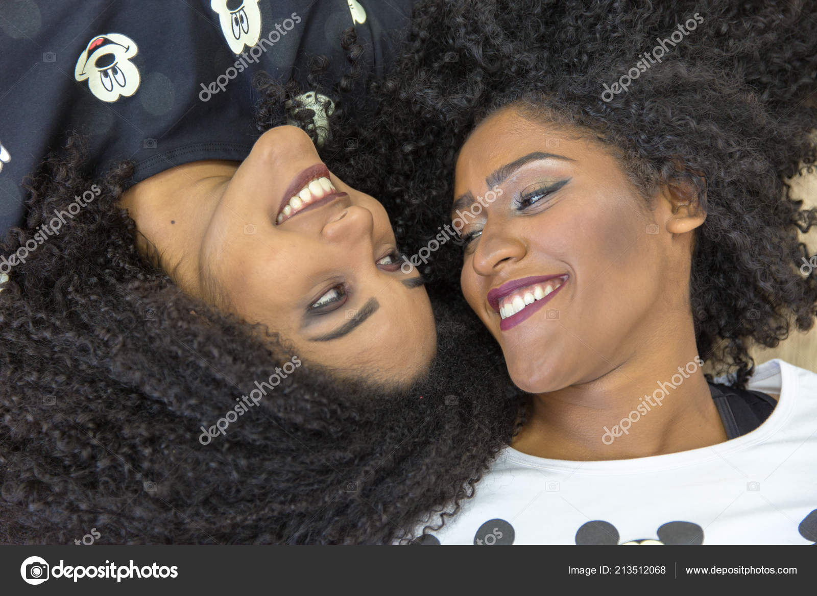 Two Ebony lesbos having fun.