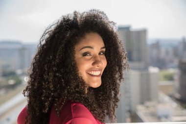 Portrait of smiling young black woman clipart