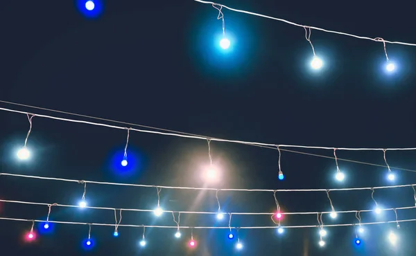 Slinger Met Gekleurde Lichten Decoratieve Verlichting Achtergrond — Stockfoto