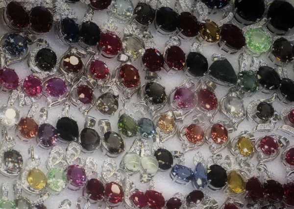 Bright Cheap Women Bijouterie Jewelry Shiny Glass Background — Stock Photo, Image