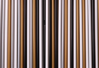 Payet çok renkli plastik tüpler arka planı için olağandışı renk kümesi