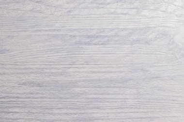 Beyaz rustik ahşap masa arka planda ışık ışınları doku. Görünür koyu boya