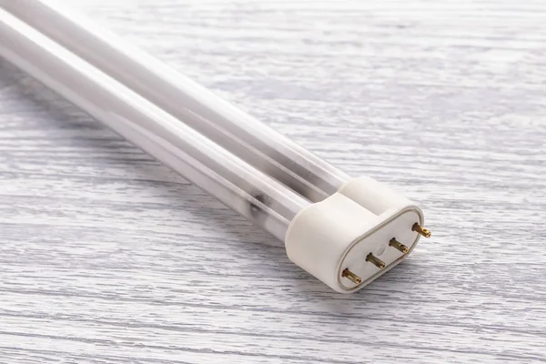 Vücut üzerinde yanmış floresan lamba Pl-L, ateş siyah iz kişiler