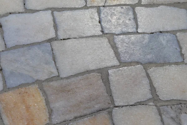 Surface de quartz d'une rue multicolore pavés de route . — Photo