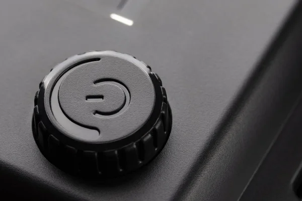 Чорна пластикова кнопка вимикання живлення з регулюванням потужності . — стокове фото