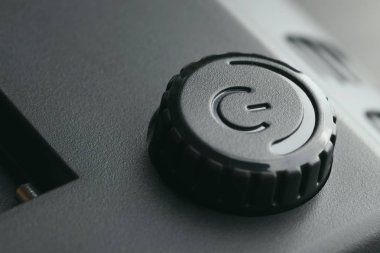 Güç ayarlama işlevi ile kapalı düğme.