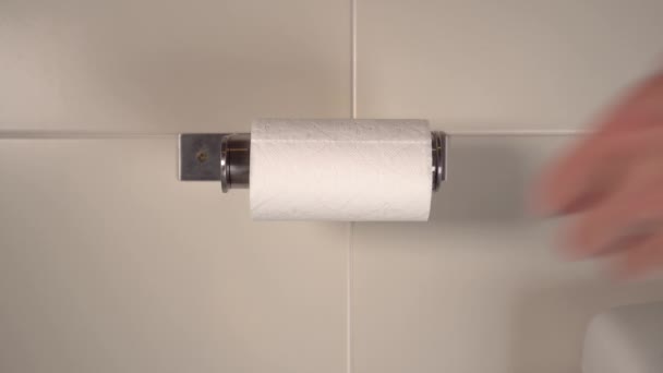 Hand Turns Roll Gently Tears Toilet Paper Toilet Beige Walls — Stock Video