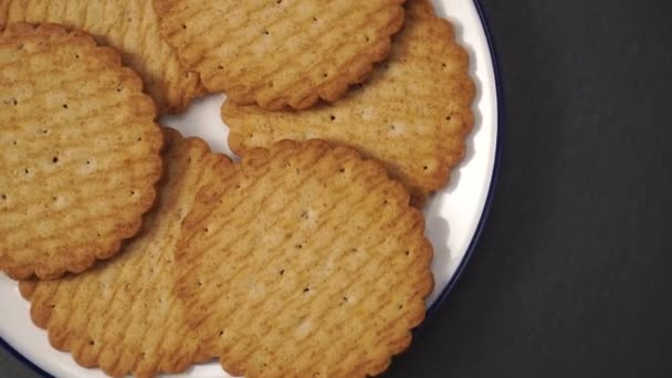 Appetizing Golden Shortbread Cookies White Plate Blue Border Gray Stone — Stock Video