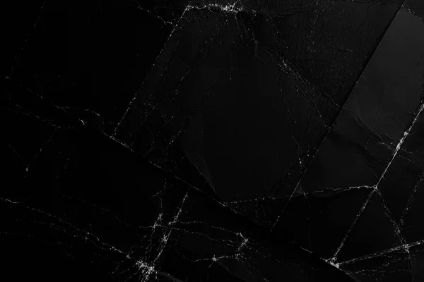 Siyah buruşuk kağıttan yapılmış arka plan. Soyut dramatik görünüm