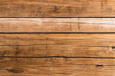 Çatlamış kahverengi ahşap doku. Eski tahta arka plan.