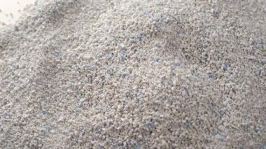 Emici kedi kumu yakın plan. Yavaş dönüş. Hayvan bakımı için hijyen kavramı