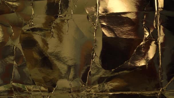 Смятый Золотой Упаковочный Картон Фольгой Складками Абстрактный Потрепанный Фон Лицензионные Стоковые Видеоролики