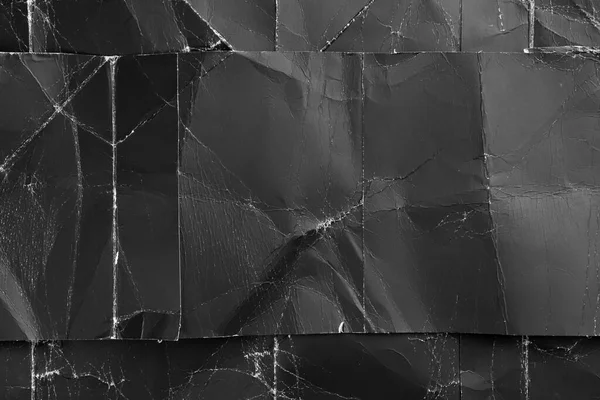 Textura Grunge Papel Arrugado Negro Con Una Raya Cortada Superpuesta — Foto de Stock
