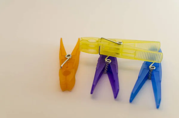 4 clothes clips in different colors